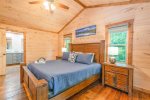 Upper Level Master Suite Features King Bed, Flat Screen Tv, Private Bath, and Access to Private Covered Deck